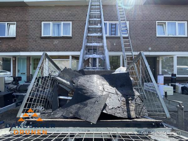 Kosten dakreparatie: dakschade aan flatgebouw in Drunen Kosten dakreparatie: dakschade aan flatgebouw in Drunen